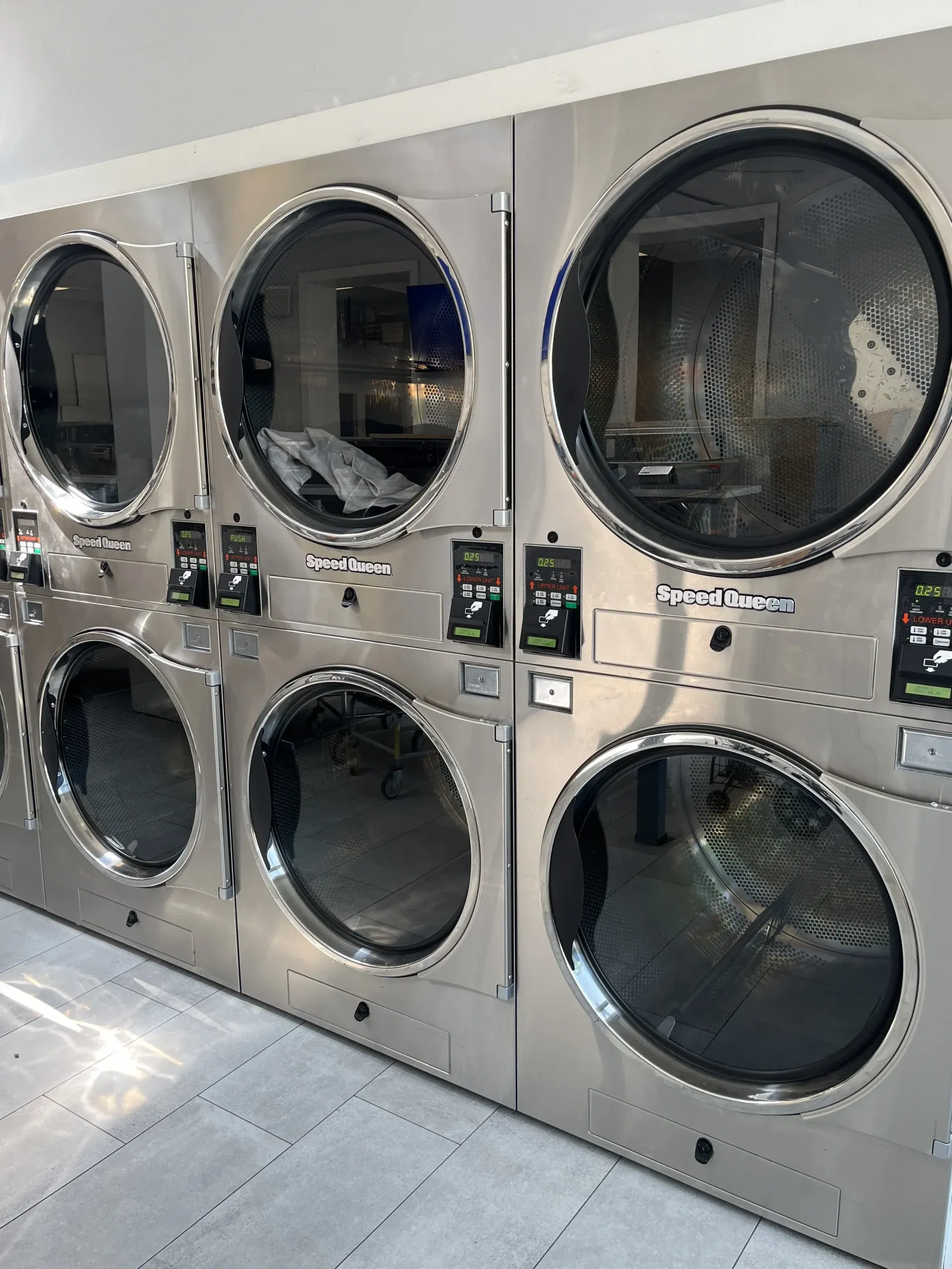 Stacked dryers at Aqua Laundry